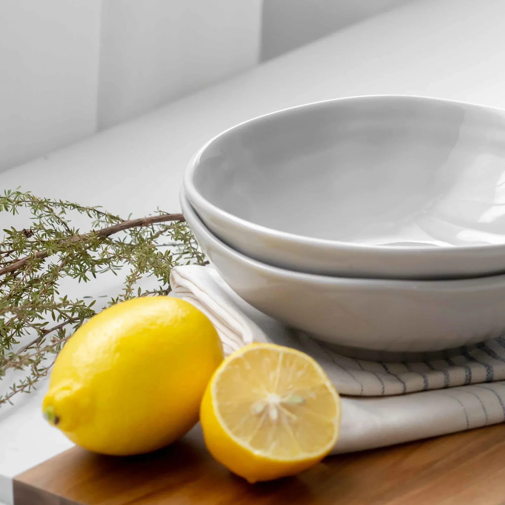 Grey bowls on a wooden board
