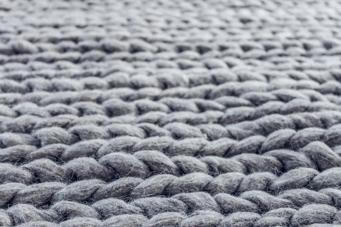 Grey cable knit close-up